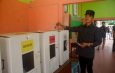 PJ Walikota Langsa Berikan Hak Suara Di TPS 22 Gampong Jawa, Kecamatan Langsa Kota